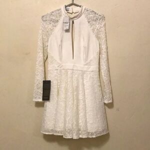 Bebe crème  long sleeve open back lace mini summer dress new w tags size medium